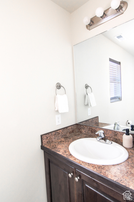Bathroom featuring vanity