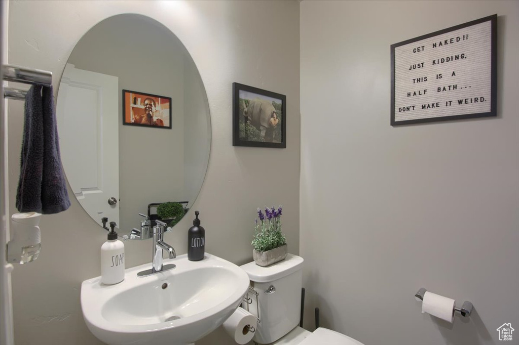 Bathroom with toilet and a sink