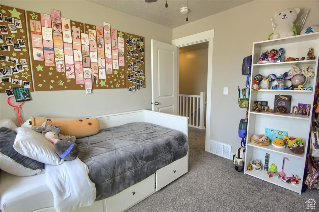 Bedroom with carpet