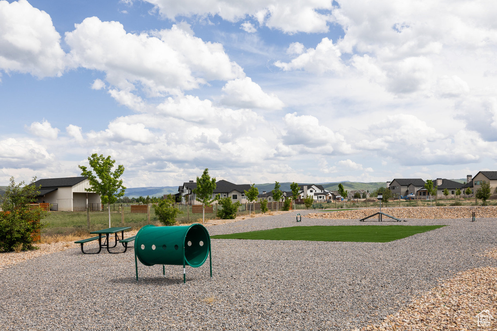 Surrounding community featuring a dog friendly area and a residential view