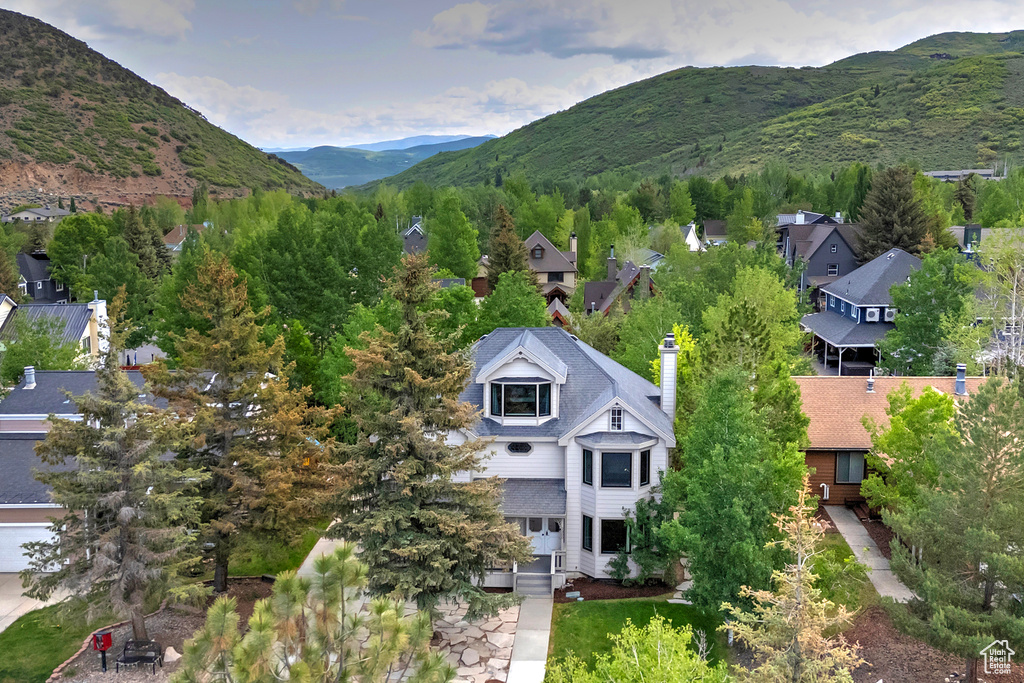 View of subject property featuring a mountain backdrop