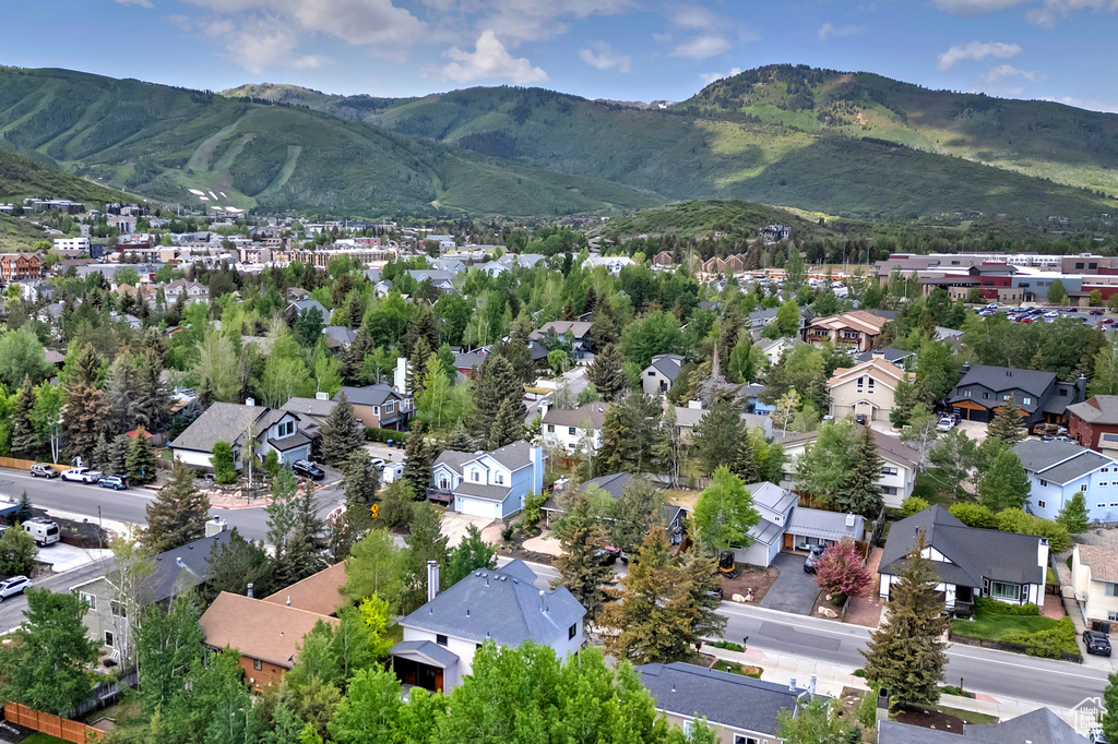 Aerial view of residential area with a mountainous background