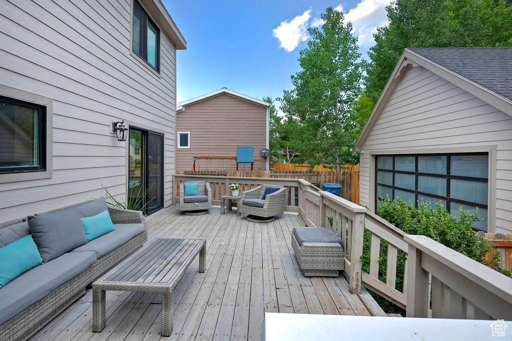 Wooden terrace with outdoor lounge area