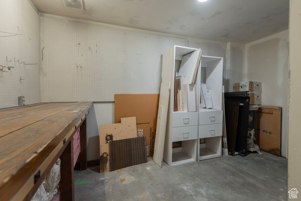 Basement featuring a workshop area