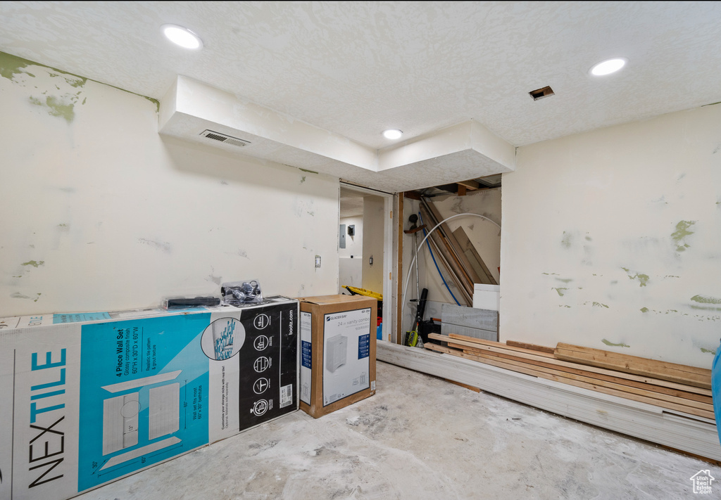 Unfinished below grade area featuring recessed lighting