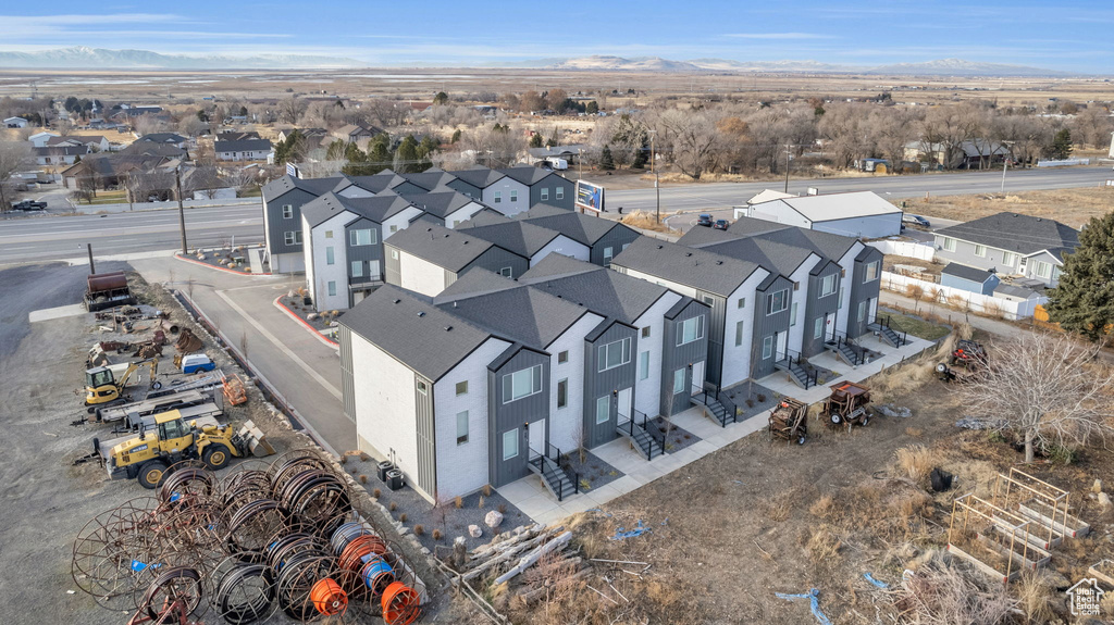 Aerial view of residential area with mountains