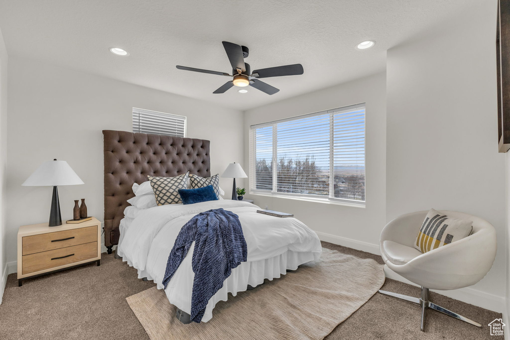 Bedroom with carpet floors, baseboards, a ceiling fan, and recessed lighting