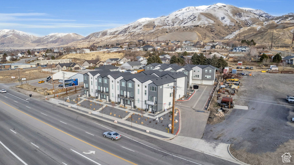 Aerial view of residential area with a mountain backdrop