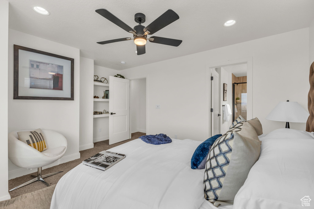Carpeted bedroom with baseboards, ceiling fan, and recessed lighting