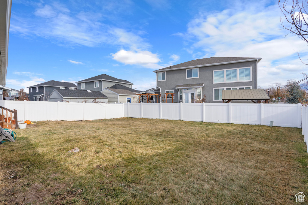 View of yard with a residential view