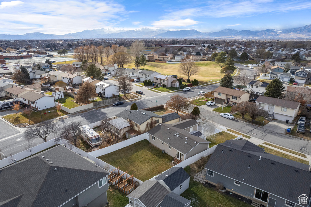 Aerial view of residential area with a mountainous background