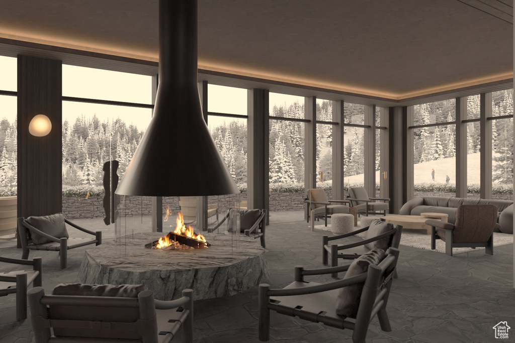 View of patio / terrace with an outdoor living space with a fire pit