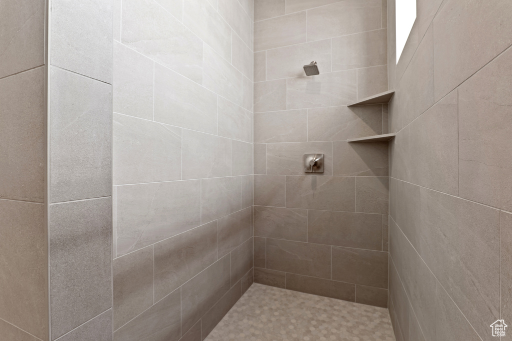 Bathroom with tiled shower