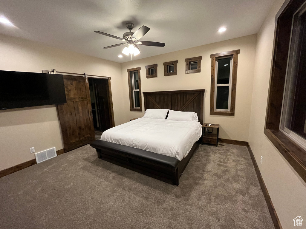 Carpeted bedroom with baseboards, recessed lighting, and ceiling fan