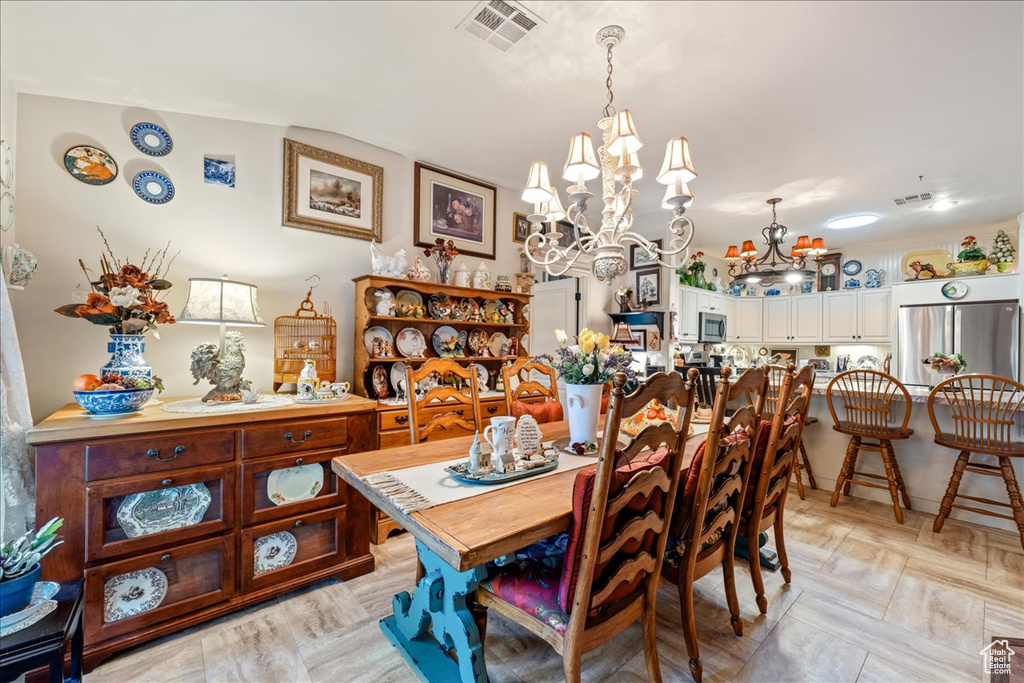 Dining space featuring a chandelier
