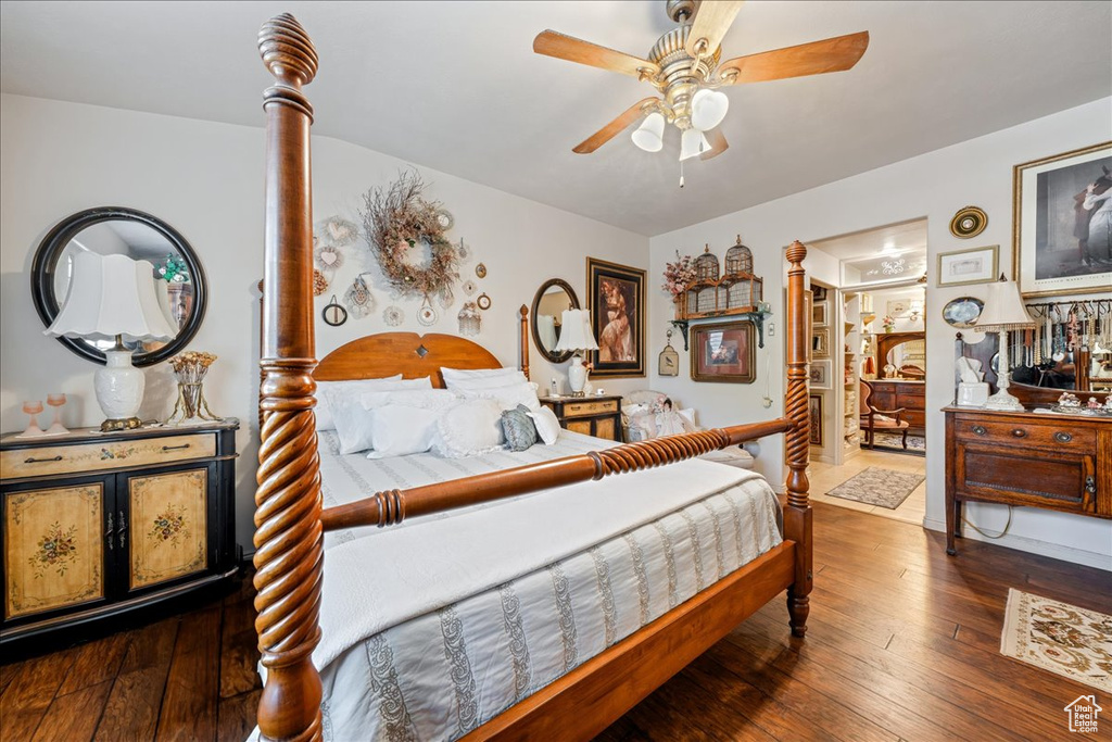 Bedroom with wood-type flooring and ceiling fan
