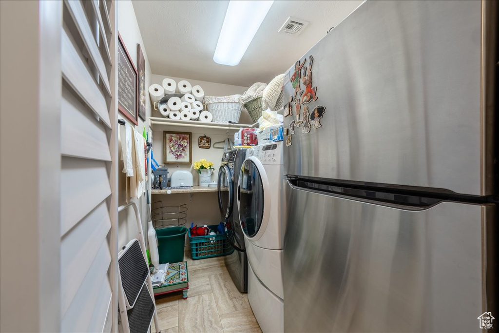 Laundry area with separate washer and dryer