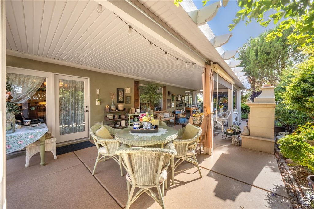View of patio featuring outdoor dining area