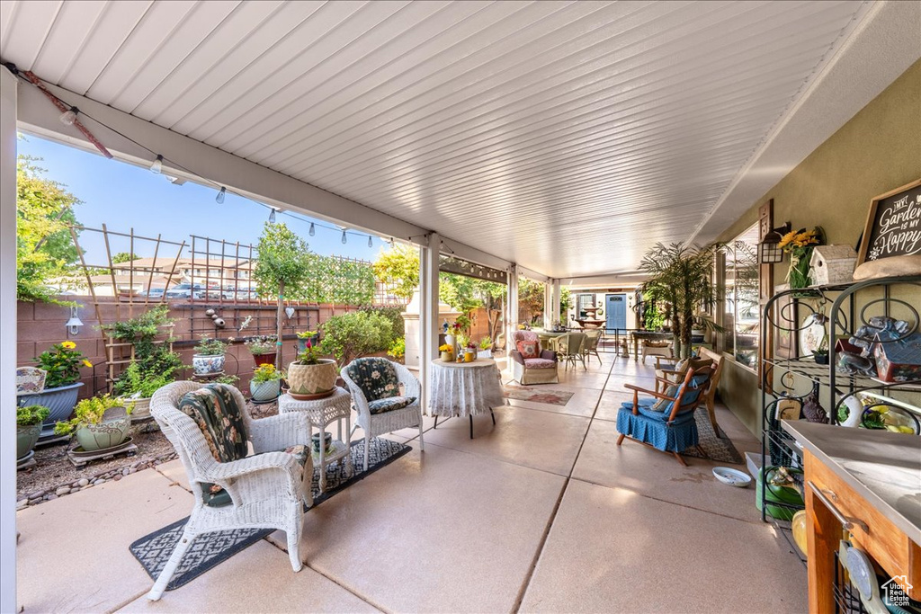Fenced backyard featuring a patio area and outdoor dining area