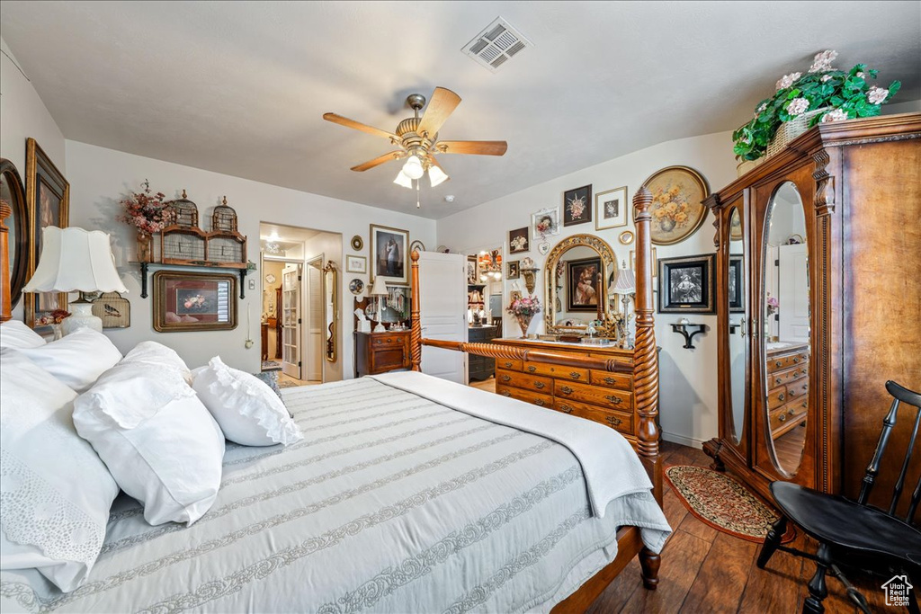 Bedroom featuring hardwood / wood-style flooring and ceiling fan
