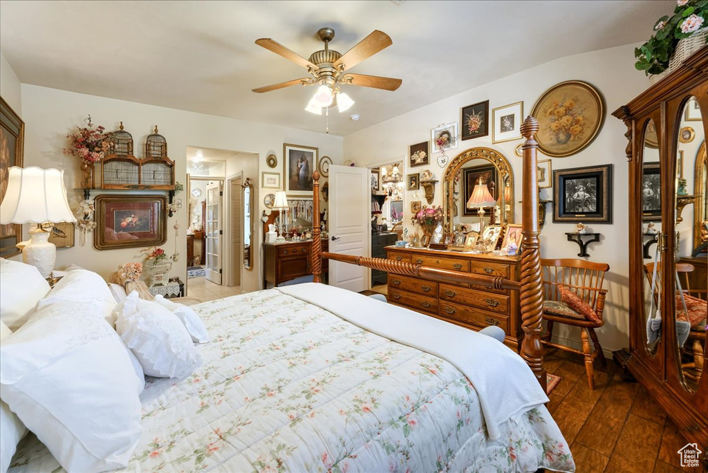 Bedroom with wood-type flooring and a ceiling fan
