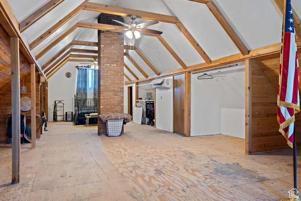 Unfinished attic with a wall unit AC