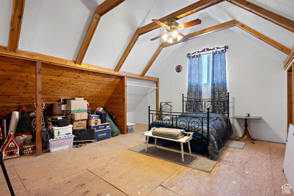 Bedroom featuring vaulted ceiling
