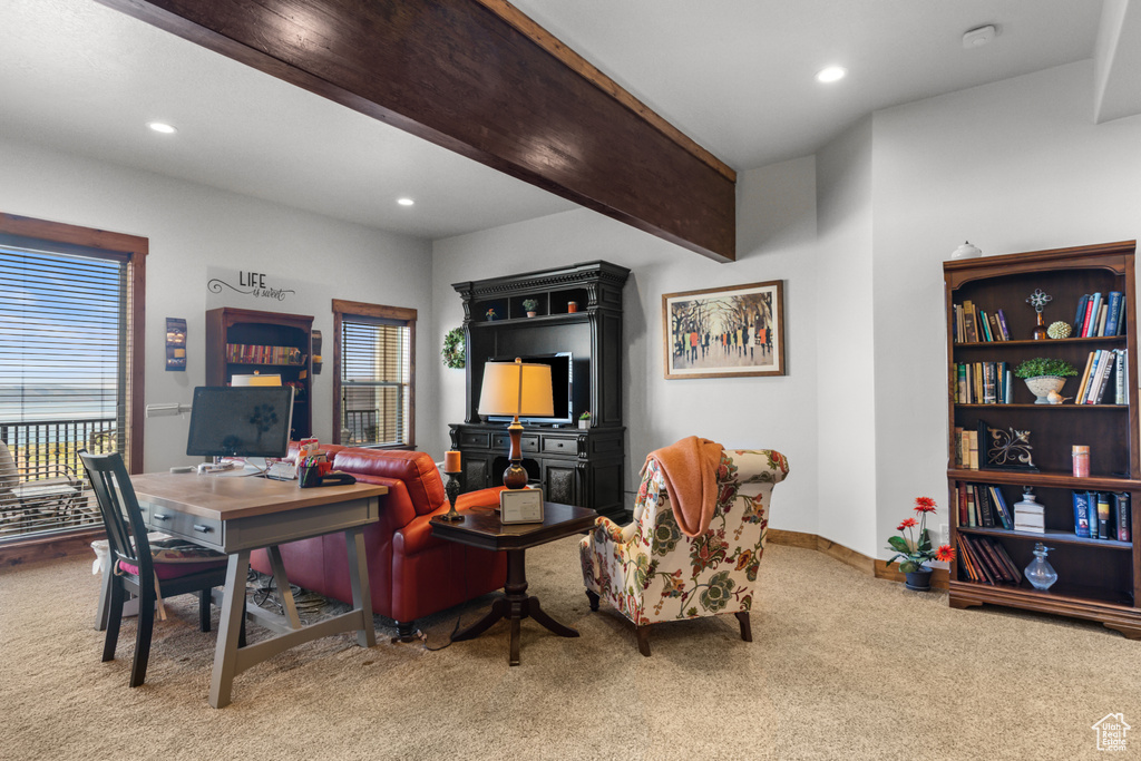 Carpeted living room featuring recessed lighting, baseboards, and an office area