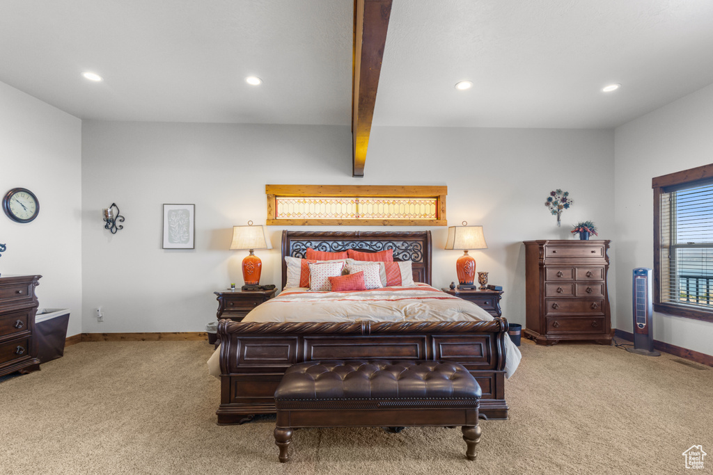 Bedroom with carpet flooring, recessed lighting, baseboards, and beam ceiling