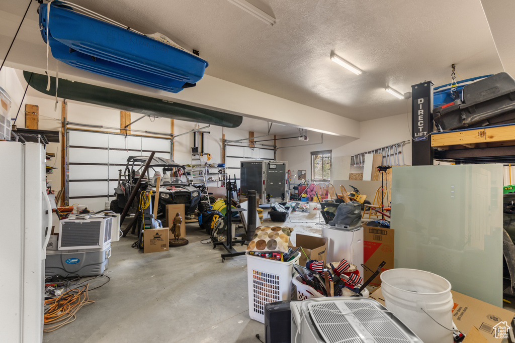 Garage with freestanding refrigerator