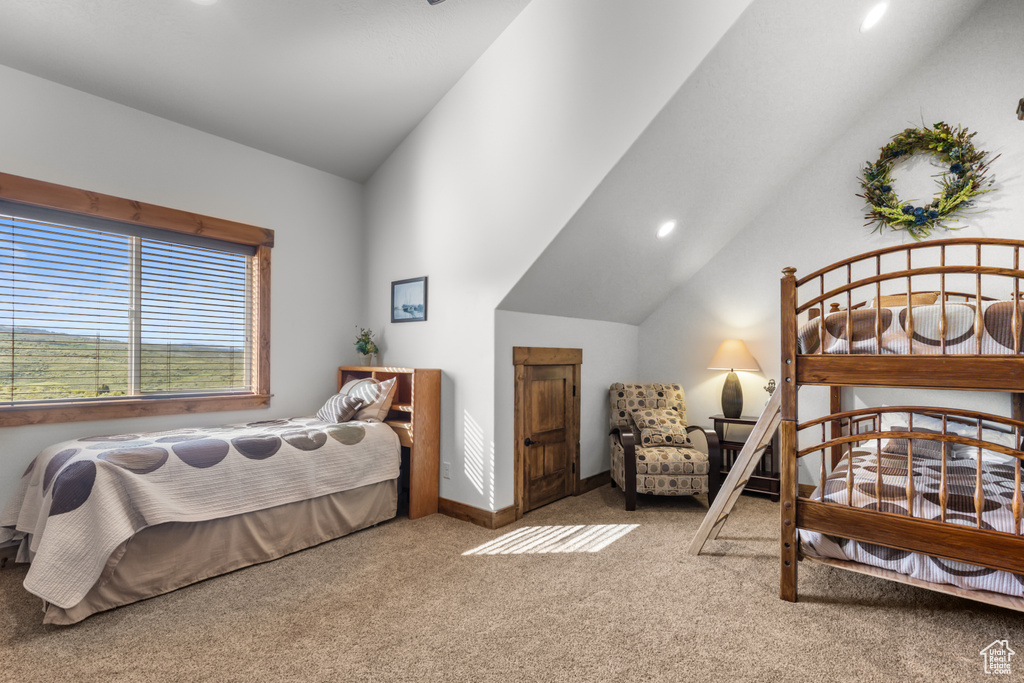 Bedroom with lofted ceiling, carpet flooring, recessed lighting, and baseboards