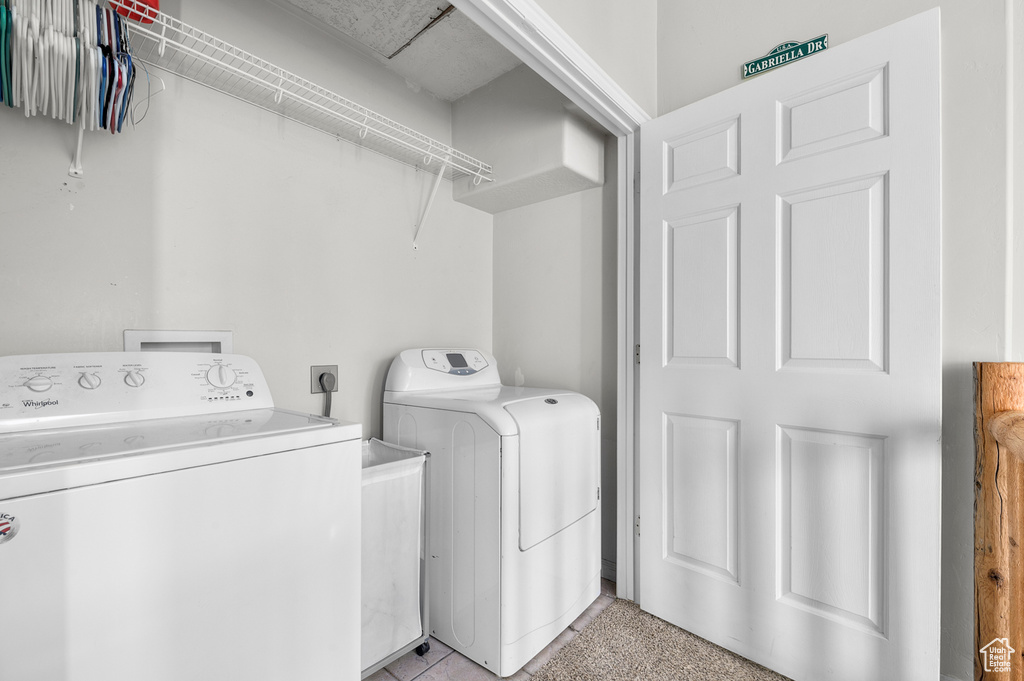 Laundry room with washer and dryer