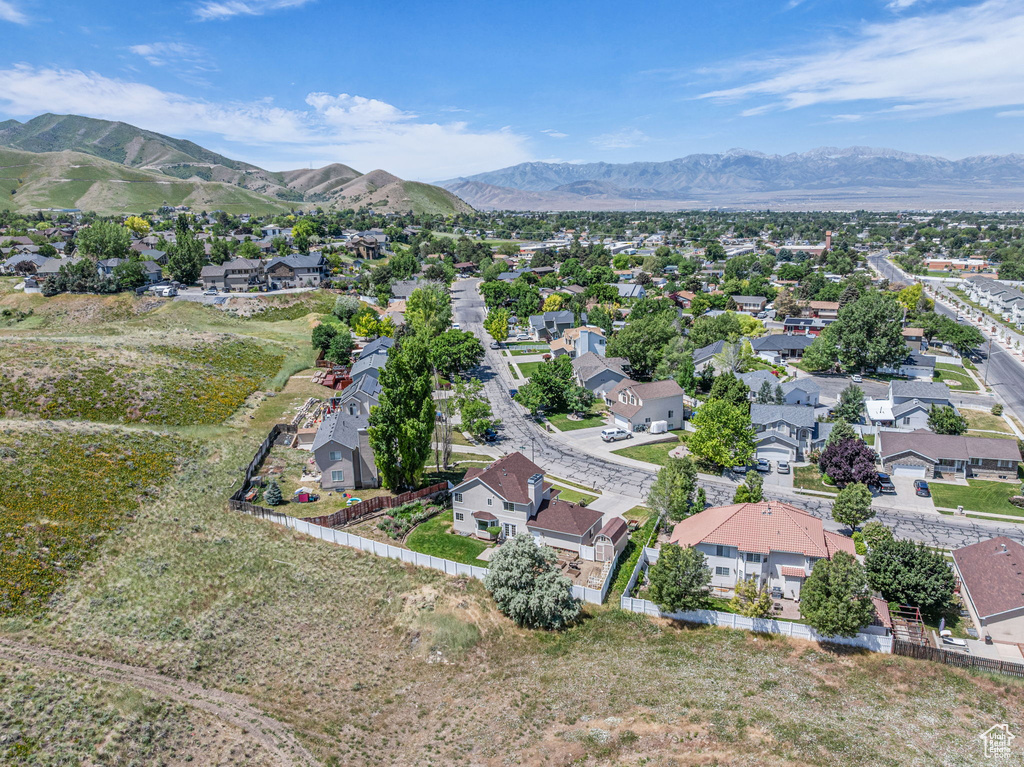 Aerial view of residential area with a mountain backdrop