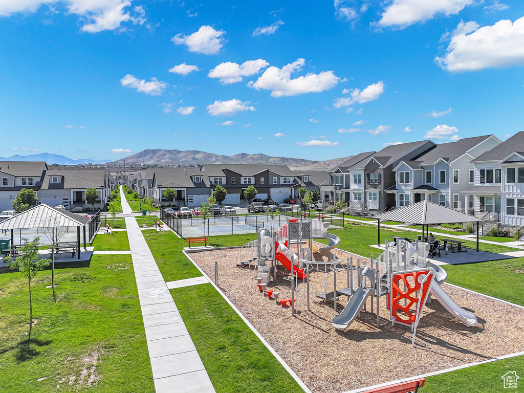 Surrounding community with a residential view, a mountain view, a yard, and a gazebo