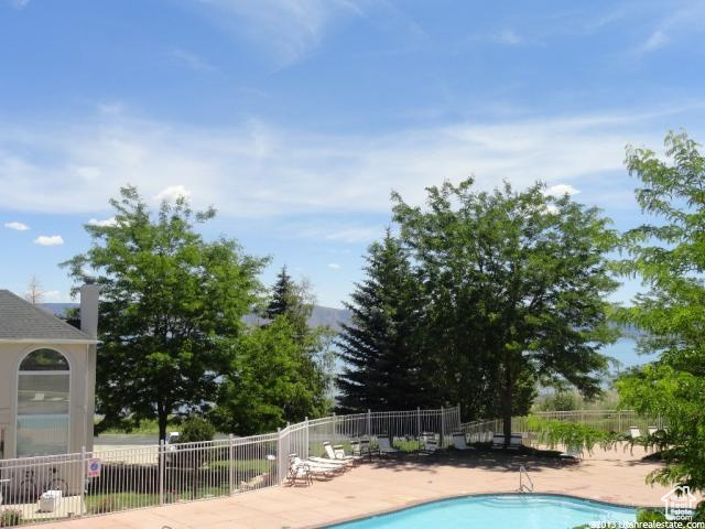 Community pool with a patio area