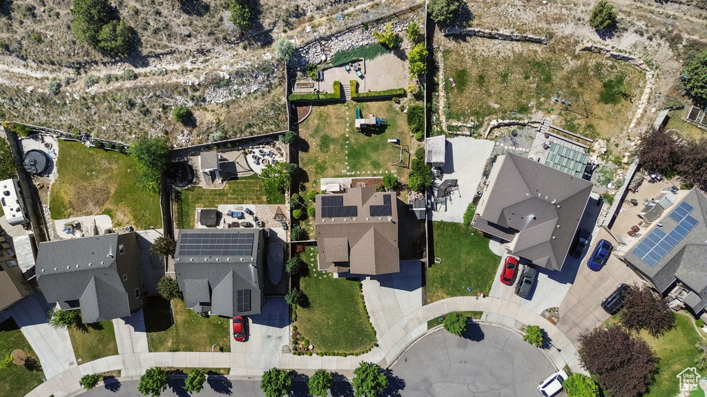 Aerial view of property's location featuring nearby suburban area