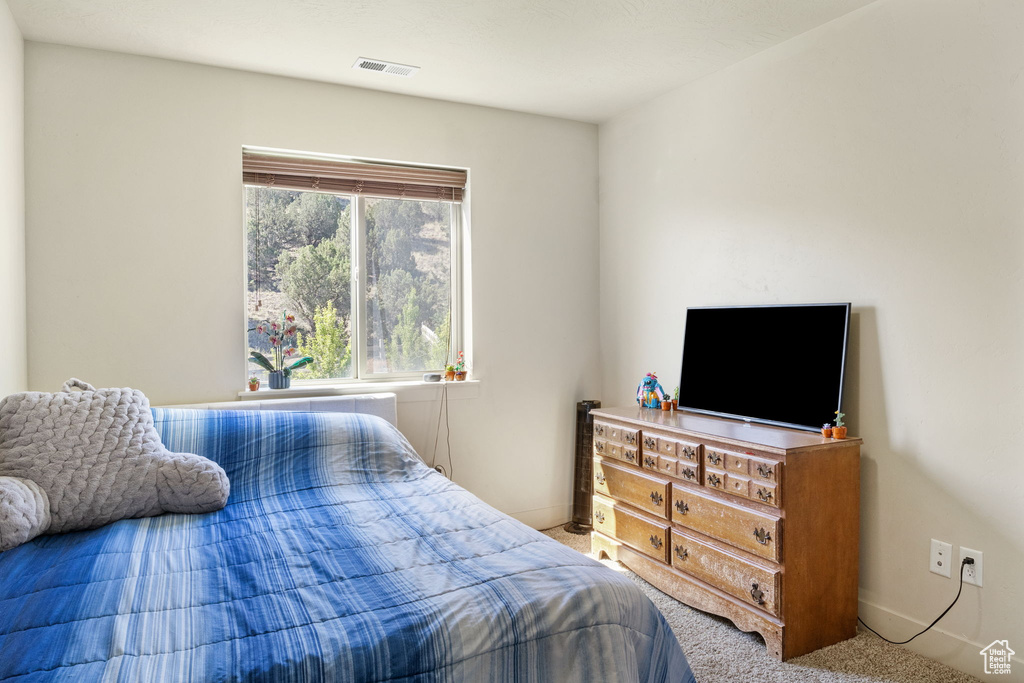 View of carpeted bedroom