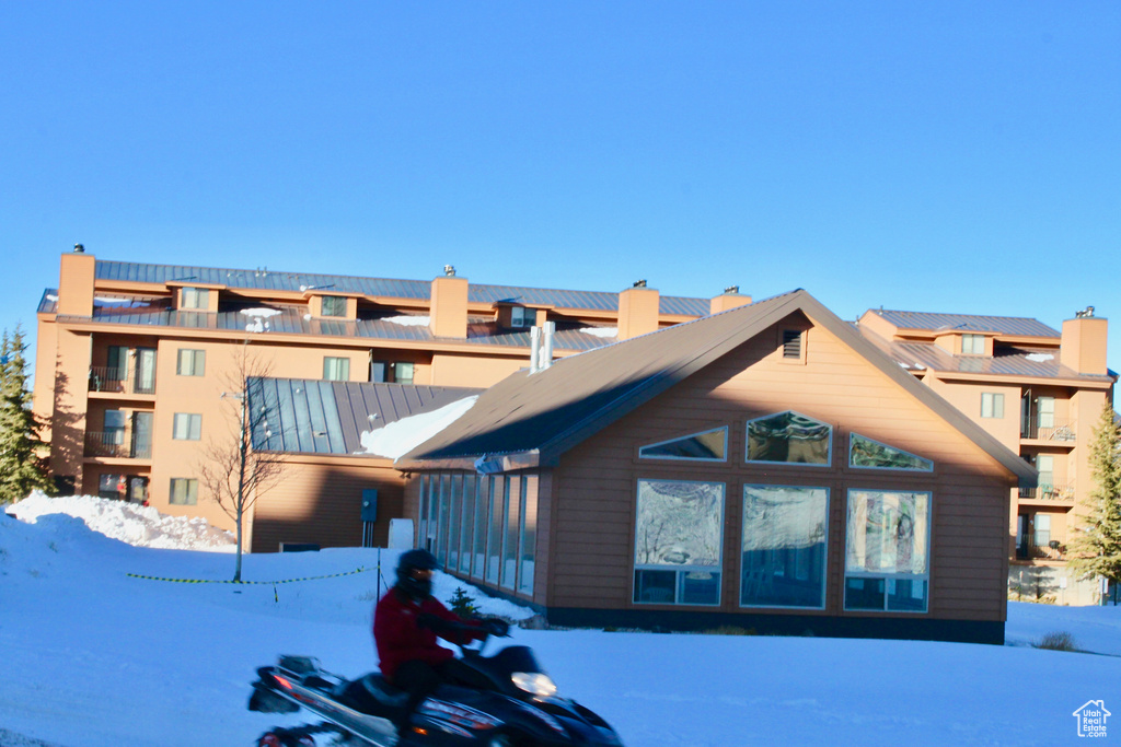View of snow covered property