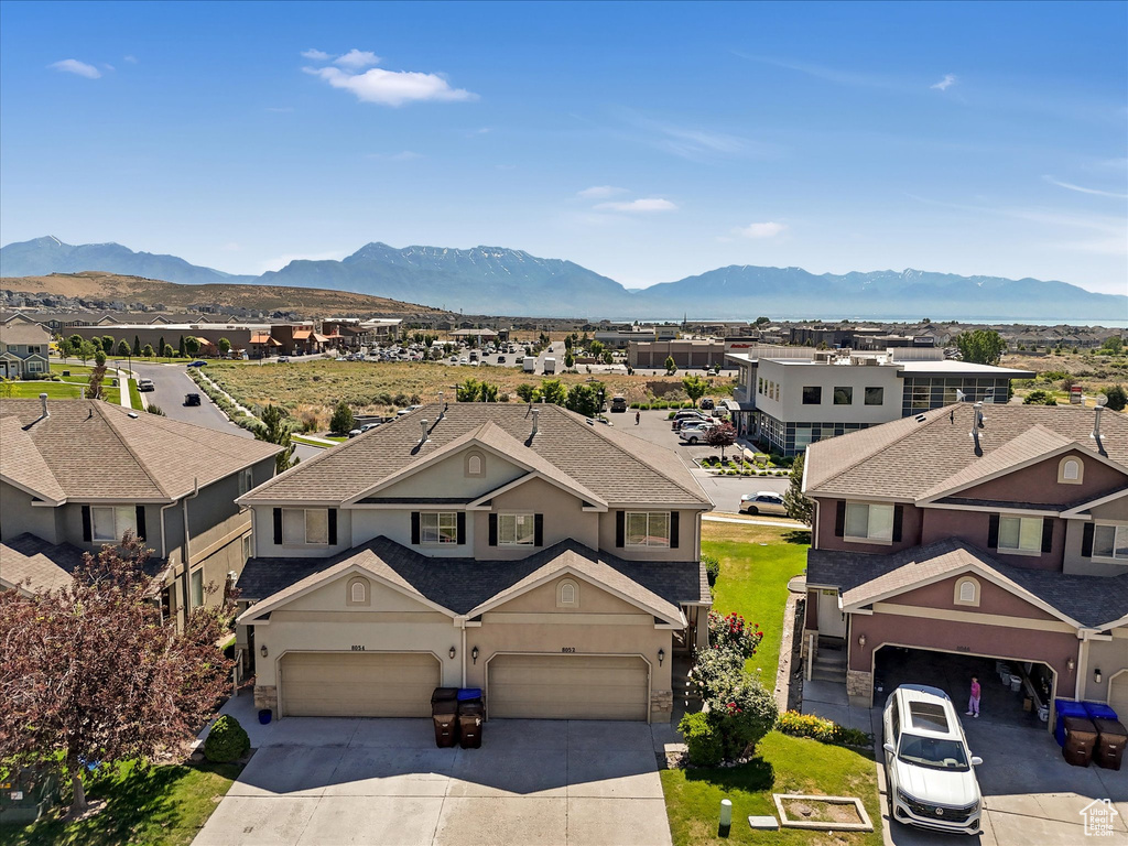 View of mountain background featuring nearby suburban area