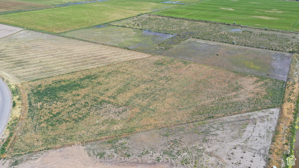 Aerial view of property and surrounding area with rural landscape