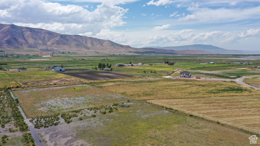 View of mountain background featuring rural landscape