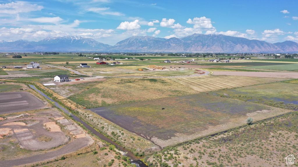 View of mountain backdrop featuring rural landscape