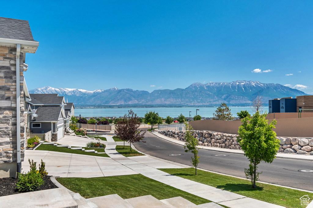 Mountain view featuring a nearby body of water