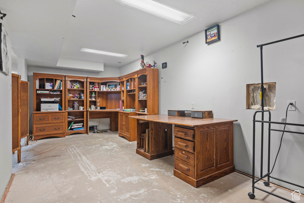 Home office with concrete floors