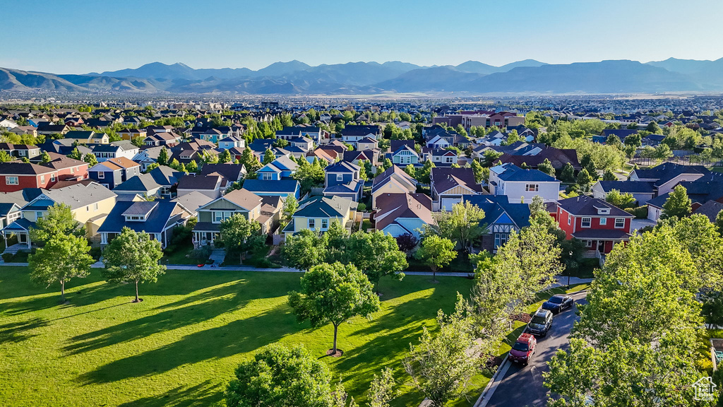 Aerial view of residential area with a mountainous background