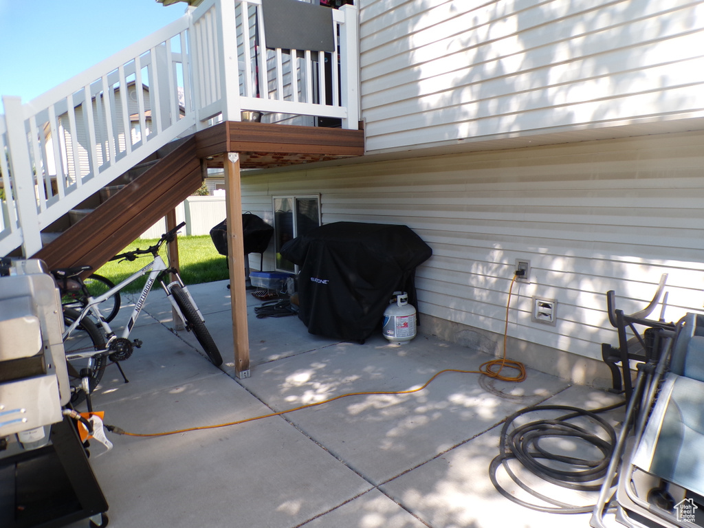 View of patio / terrace with grilling area and stairs