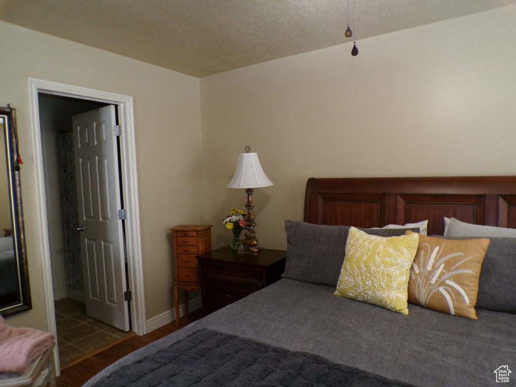 Bedroom featuring wood finished floors