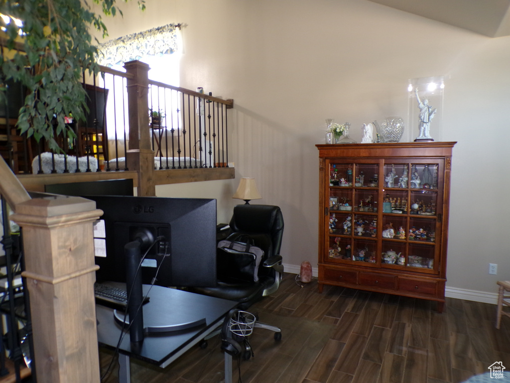Office area featuring wood finished floors and baseboards
