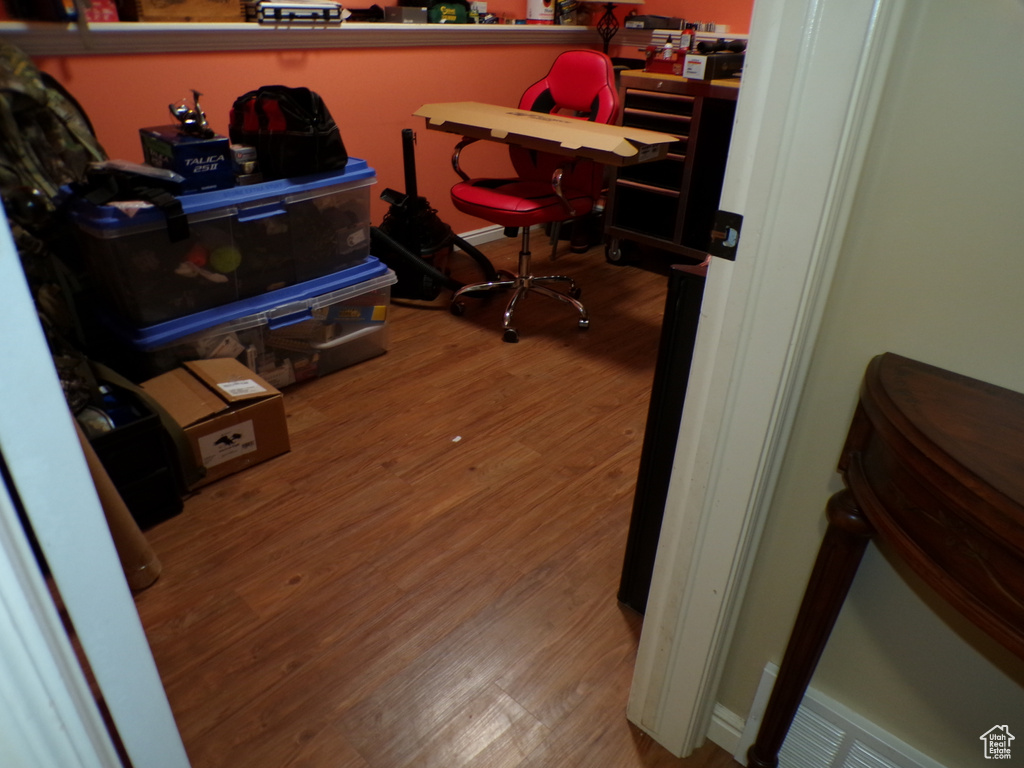 Office space with wood finished floors