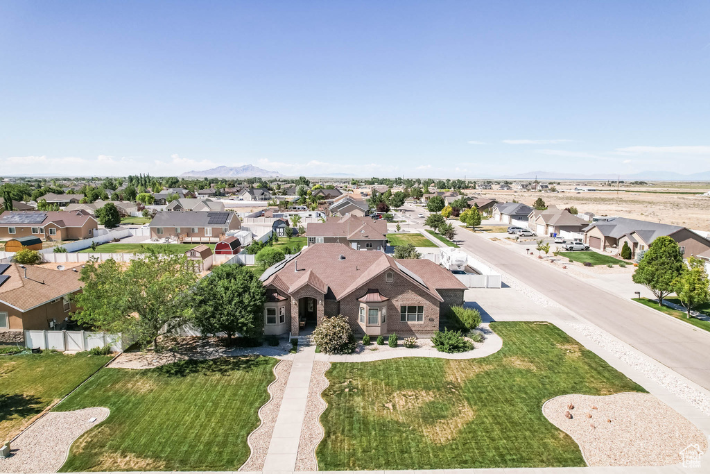 Aerial view of residential area with mountains